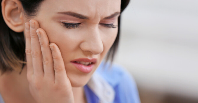 Why Does Your Jaw Click? Understanding TMJ Pain with E3 Chiropractic + Wellness in Saskatoon image